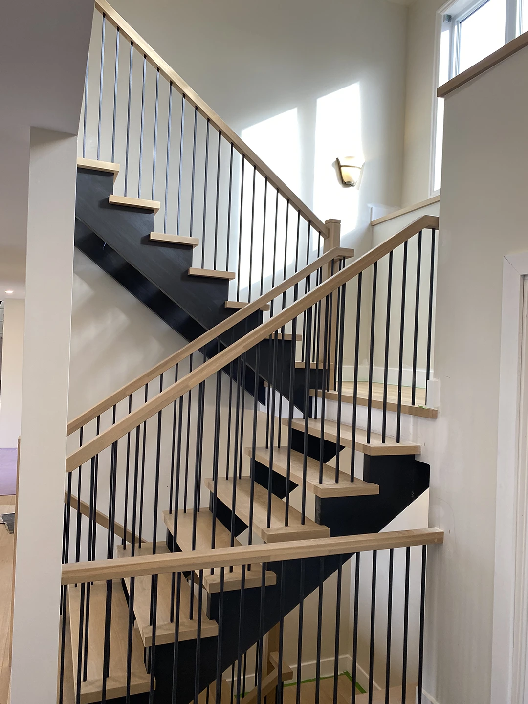 Upper landing after new wood railings were installed.
