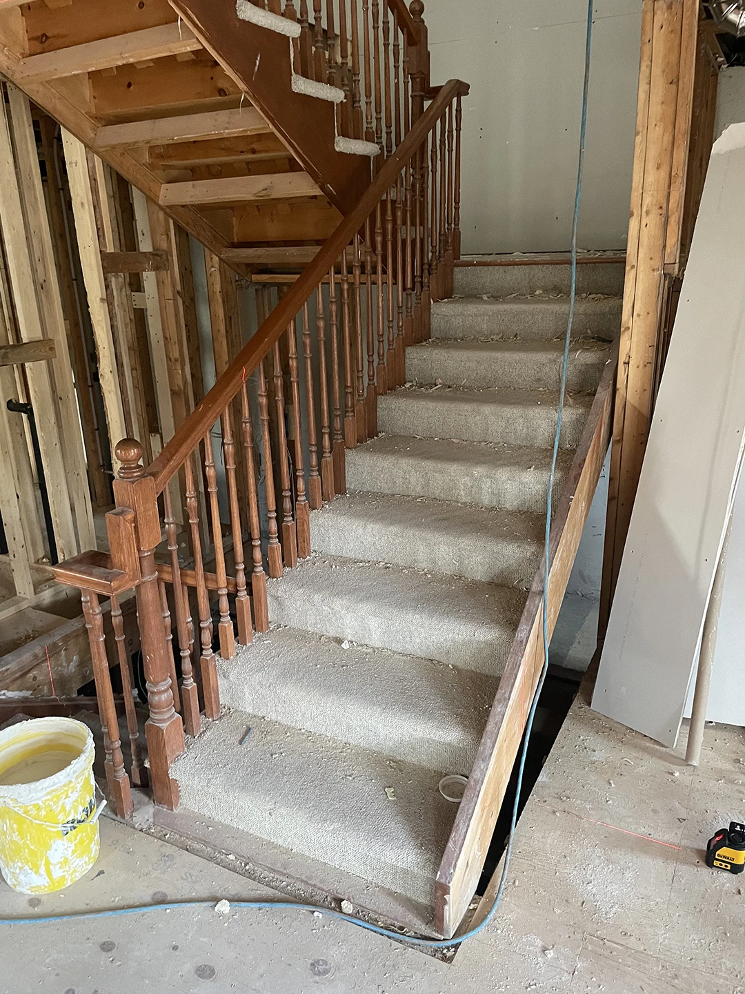 Original wood staircase before refinishing.